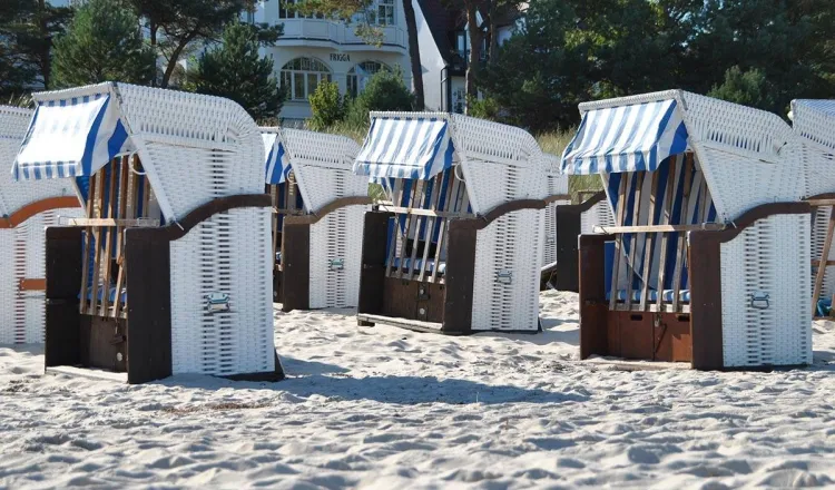 Closed beach chairs from the beach rental on the Binzer beach promenade.