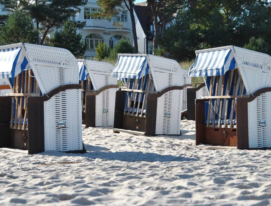 Closed beach chairs from the beach rental on the Binzer beach promenade.