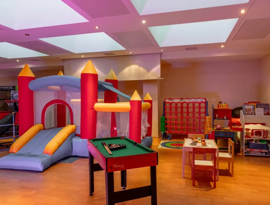 The children's club in the Arkona beach residences with bouncy castle, pool table and other children's games.