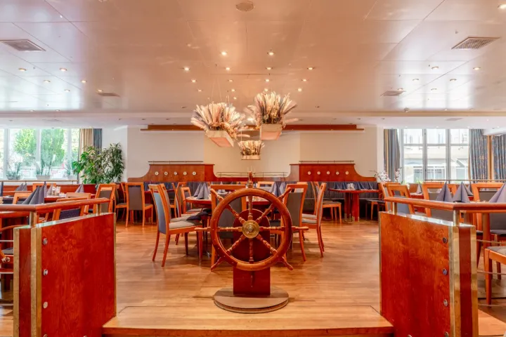 The maritime wooden interior of the Rossini restaurant in the Arkona Strandhotel on the Baltic Sea.