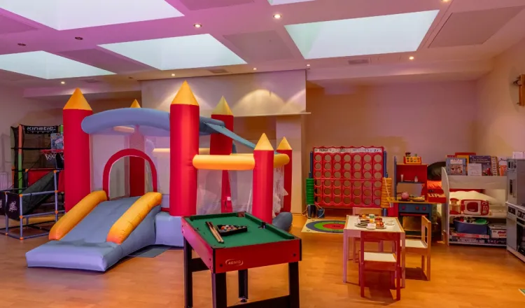 The children's club in the Arkona beach residences with bouncy castle, pool table and other children's games.